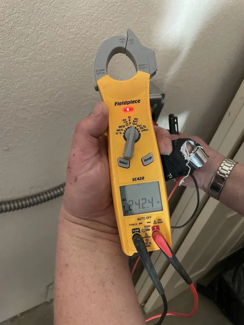 Voltage testing with clamp meter during Ceiling Fan Installation in Pleasant Hill